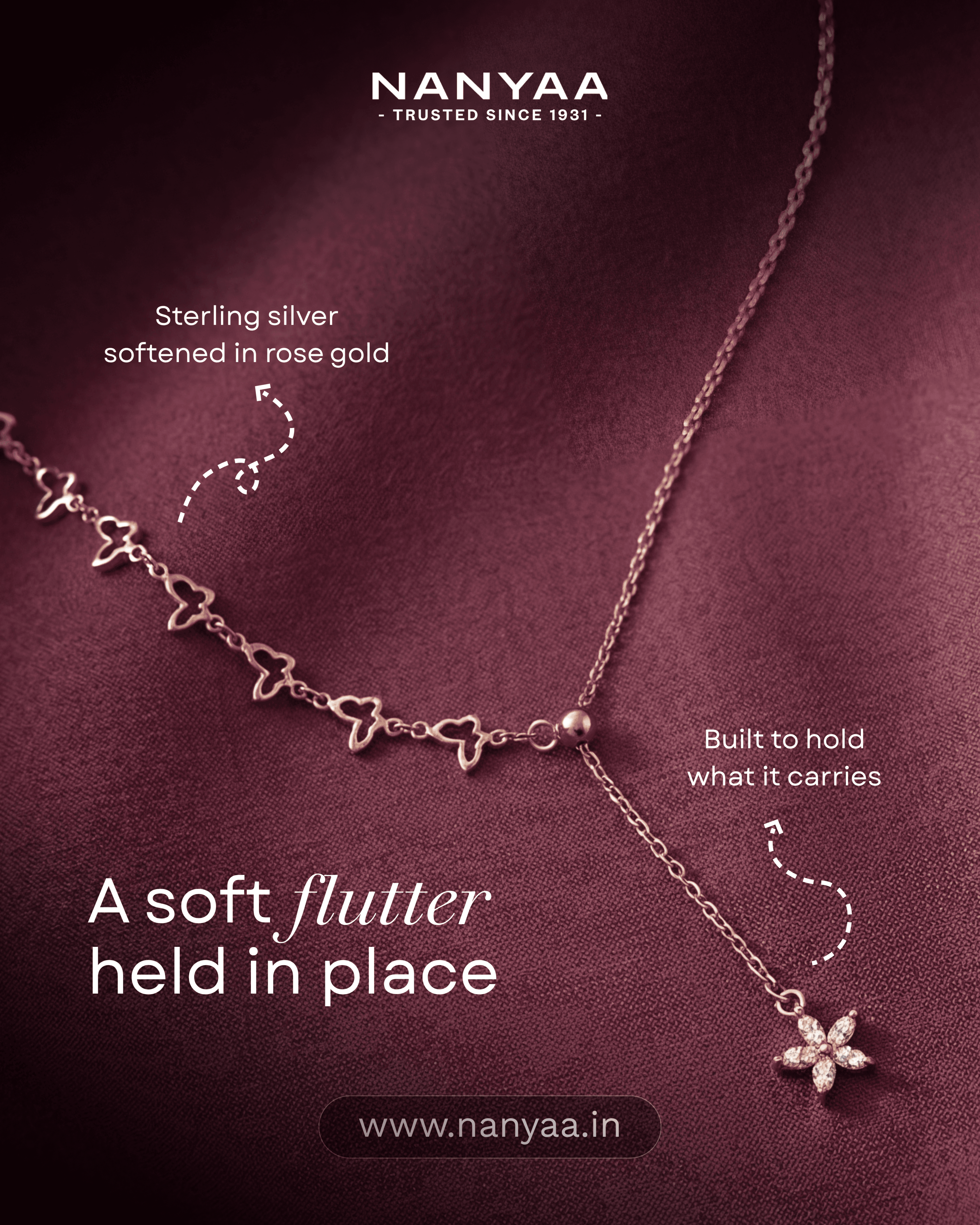 “A soft flutter held in place” post: a rose-gold butterfly chain necklace on plum fabric, annotated with its sterling silver and rose gold finish